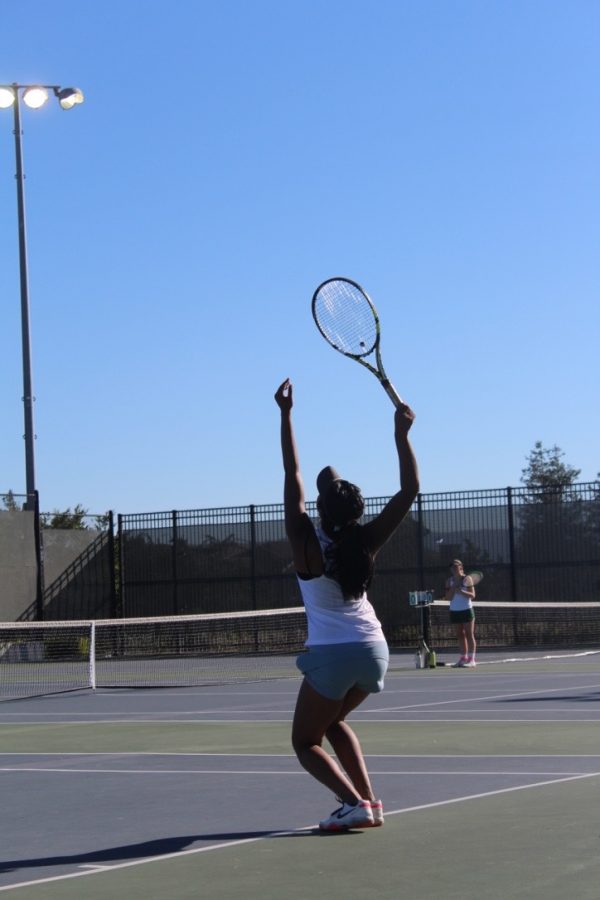 Junior Jahnavi Reddy serves to a Livermore player on Sept. 11.