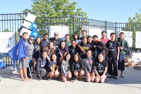 The DV swim team celebrates their victory over California High School.