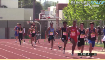 Arcadia Invitational: Aryan Srivastana, 10, the 5th runner from the right in DV's light blue jersey, runs past the 200 meter curve, 200 meters left to go.