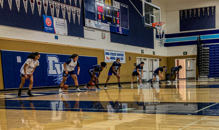 The+DVHS+varsity+women%E2%80%99s+basketball+team+season+starts+on+January+5%2C+and+until+then%2C+they+practice+and+play+for+the+pre-season.