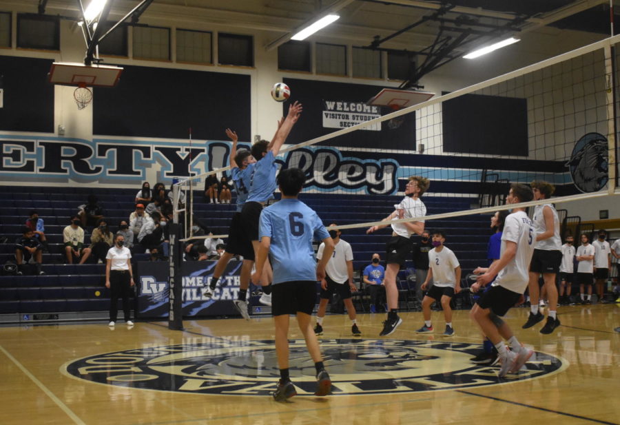 Carson Tetik and Alexander Daveynis (left to right) line up at the net to block a Foothill middle swing.