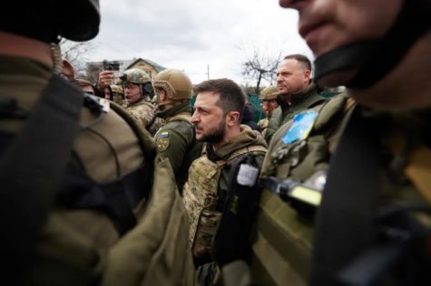 Ukraine President Volodymyr Zelenskyy meets with journalists and local residents in the Ukrainian town of Bucha. Zelenskyy asserted that Ukraine would not stop until it reached victory in the Russia-Ukraine war.