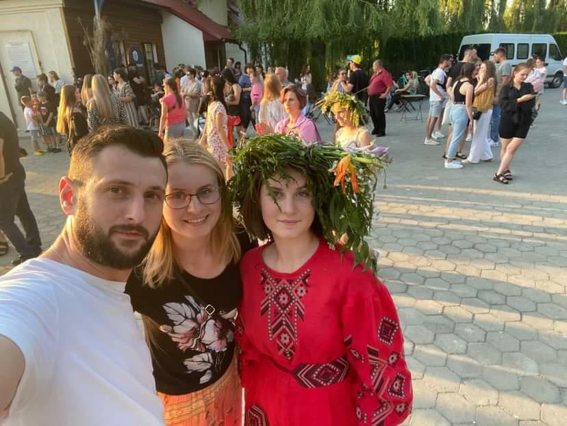 Khrapchynska and her parents attend an Ivana-Kupala celebration. Ivana-Kupala is a slavic holiday celebrated on the shortest night of the year. Here, Khrapchynska dons traditional Ukrainian clothes. 
