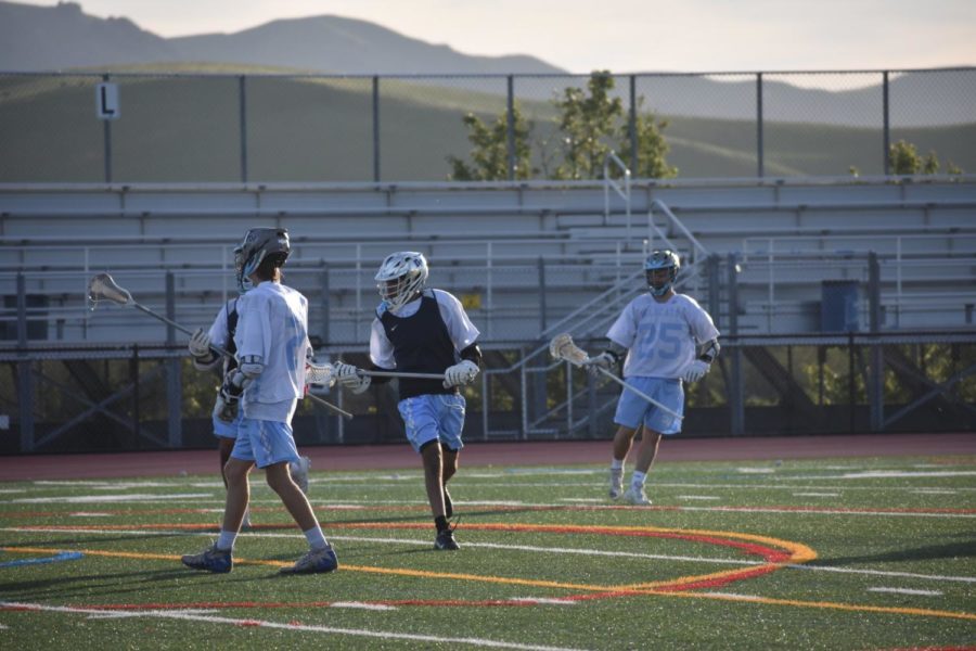 The team warms up for the game against Monte Vista on April 21.