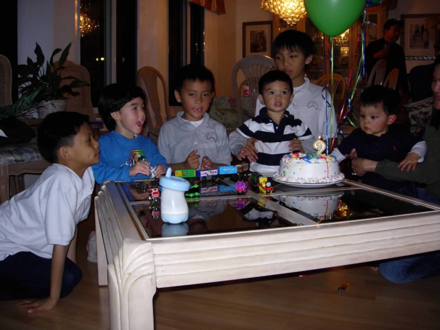 My second birthday party in Daly City, CA in the three-bedroom house I shared with cousins, aunts and grandparents.