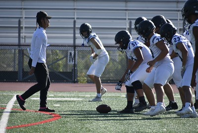  DVHS Varsity football team training for their first game of the season in Milpitas, and wearing their away game jerseys in preparation for the next night. 
