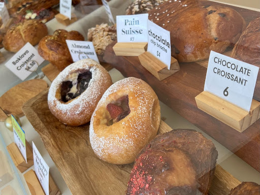 A variety of pastries and goods offered by East Bay Bakery on display.