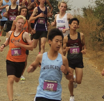 Wang (center) sprints down a slope at the Scott Bauhs Invitational on Sept. 30.
