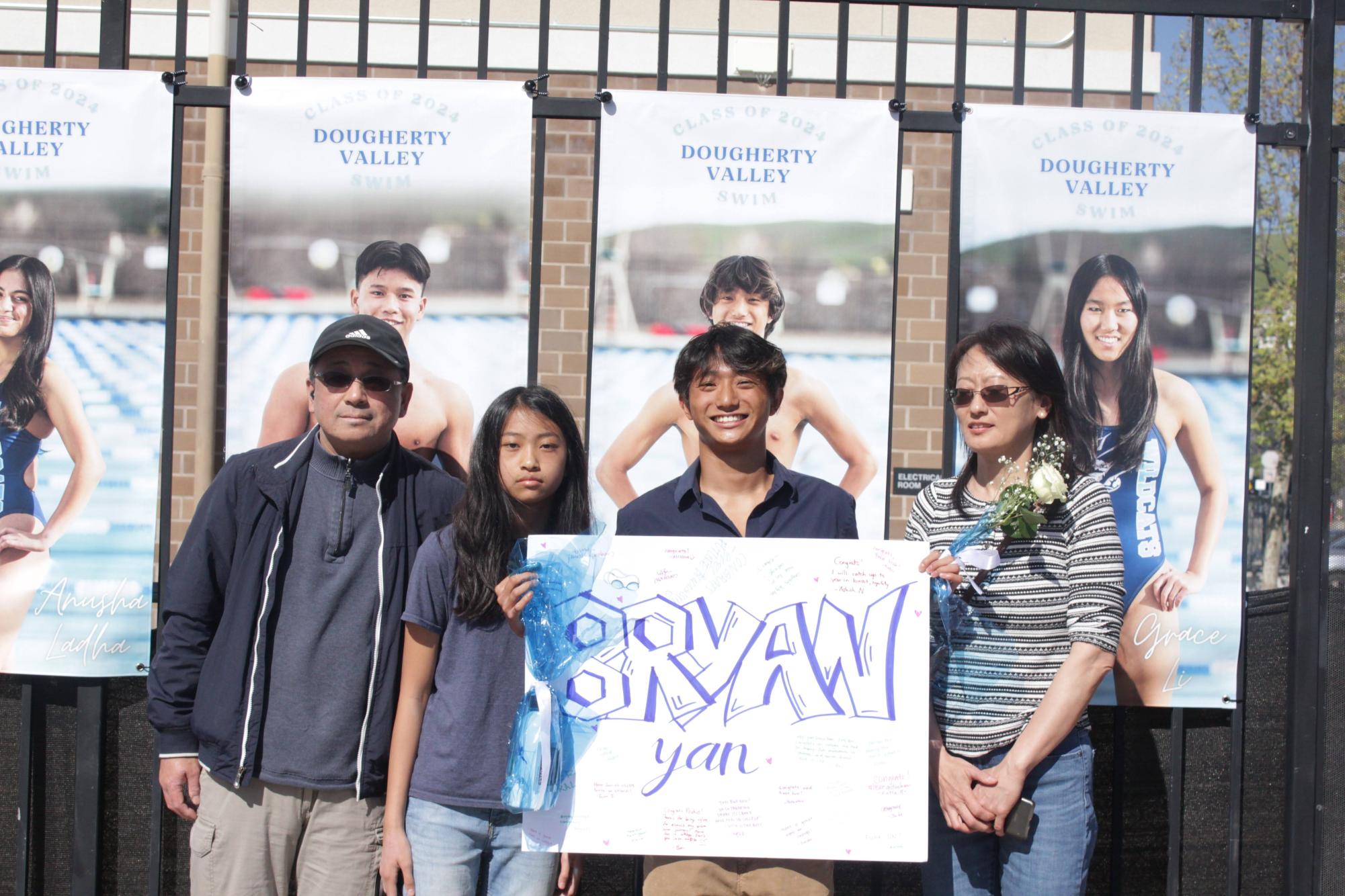 Bryan Yan and his family pose in celebration of Senior Night and his last swim meet of high school. 