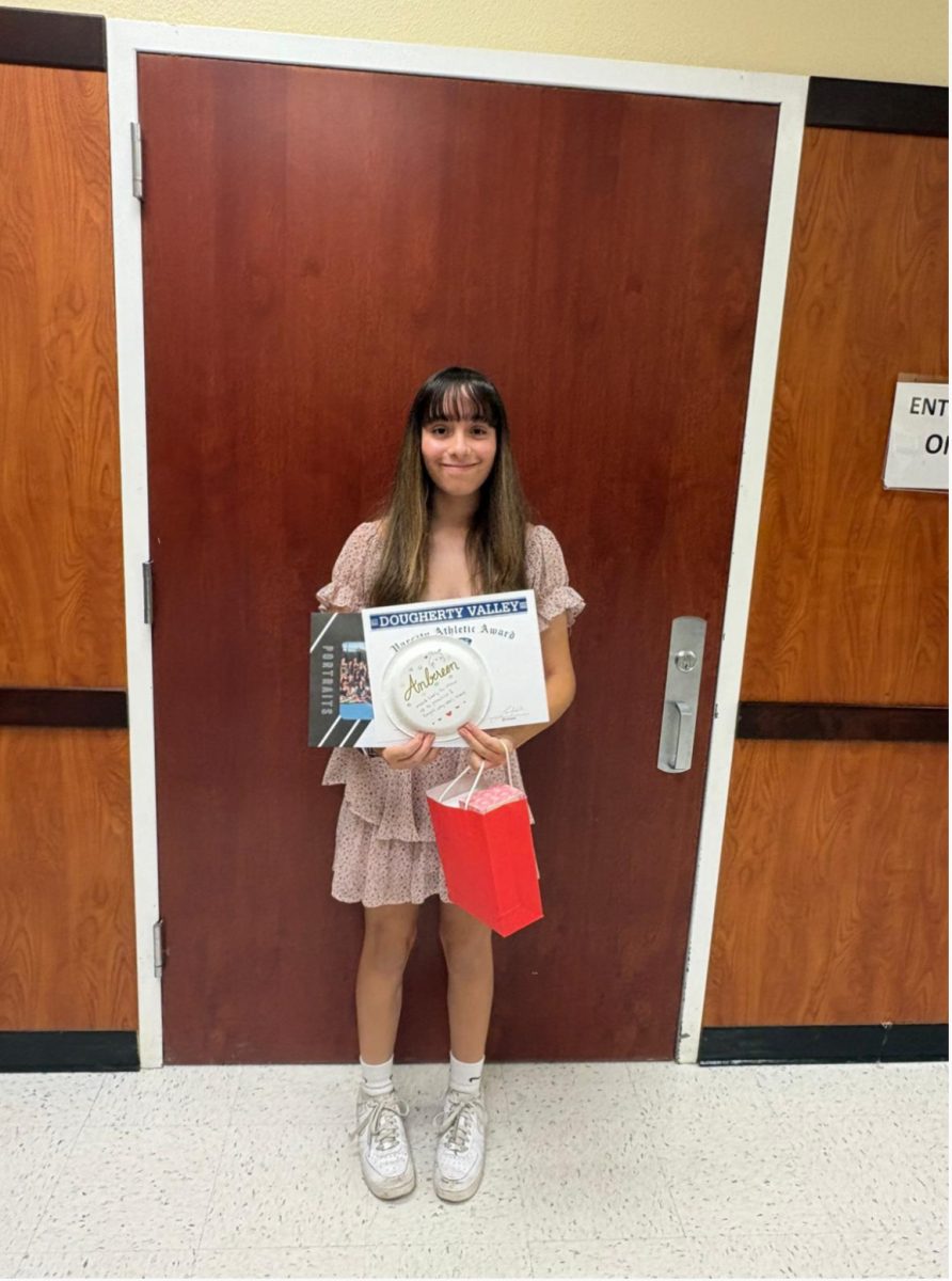 Junior Anbereen Ajina receives the Varsity Athletic Award at the women’s tennis banquet.