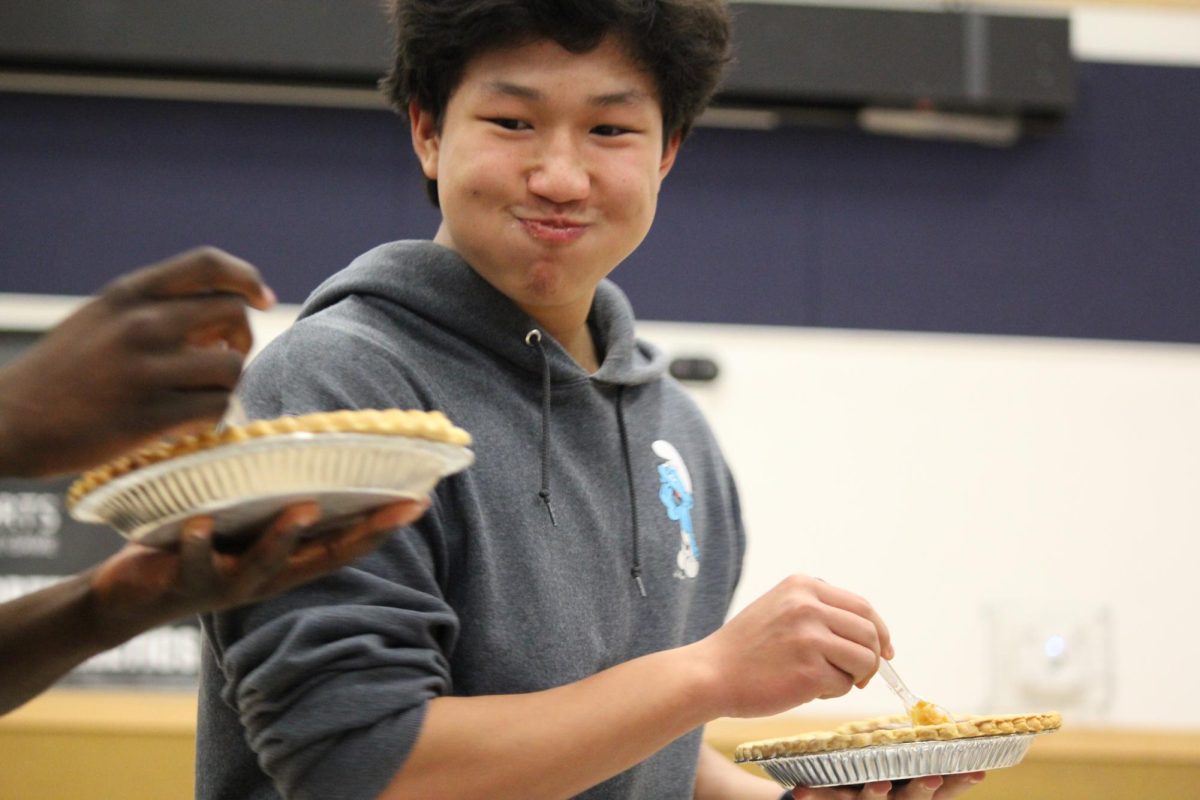 Junior Alikhan Yedilbayev gobbling down some pie 

