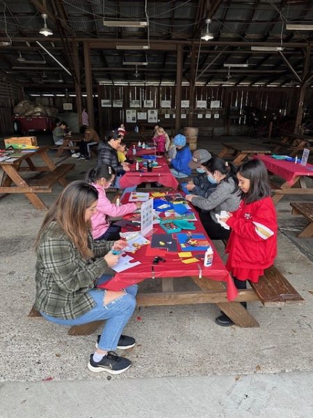 Community engage in a barn craft on Nov. 27.