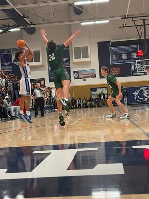 Jalen Stokes shoots a three point jumper in DVHS’s game against De La Salle on Jan.17, 2025.
