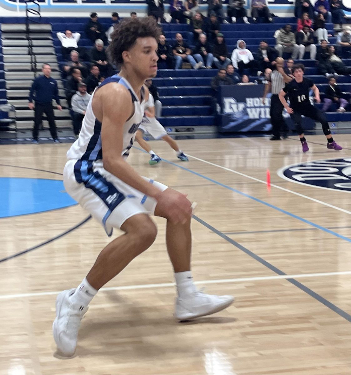 Stokes guards the ball at the Feb. 4 game against Amador Valley High