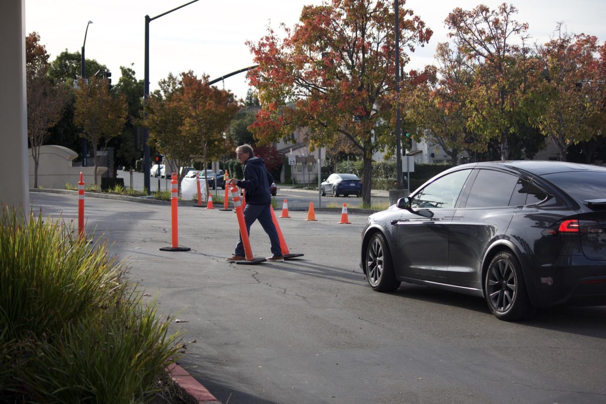 Bill Faraghan controls traffic during morning school rush.