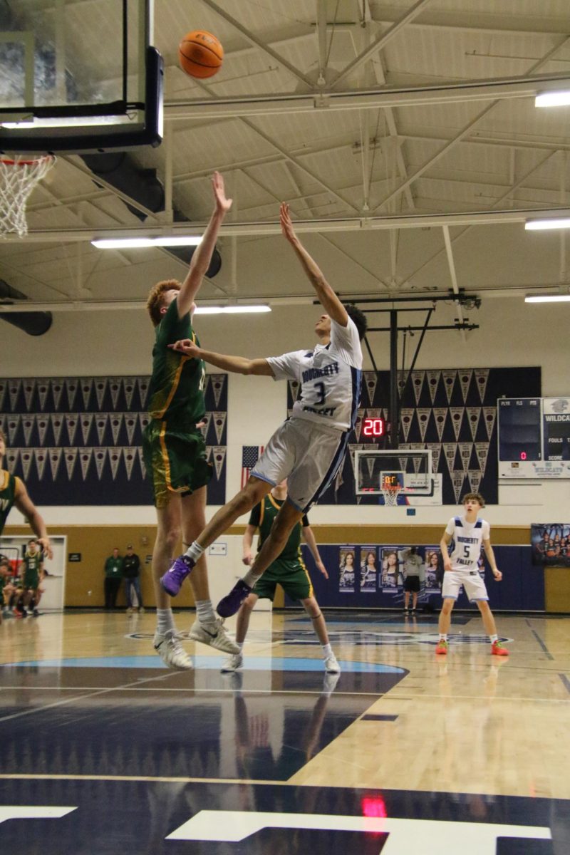 Senior Rashod Cotton Jr. shoots a left handed shot against San Ramon Valley High School.