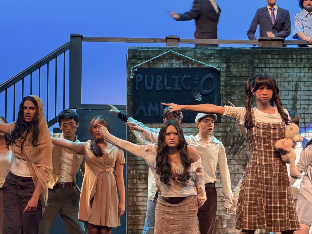 The cast of “Urinetown: The Musical” balances comedy with a cautionary message.