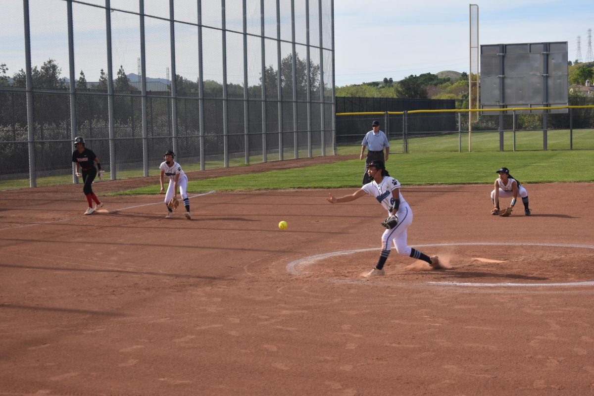 DVHS varsity softball junior Mikayla Roxas throws a pitch on March 26, 2026.