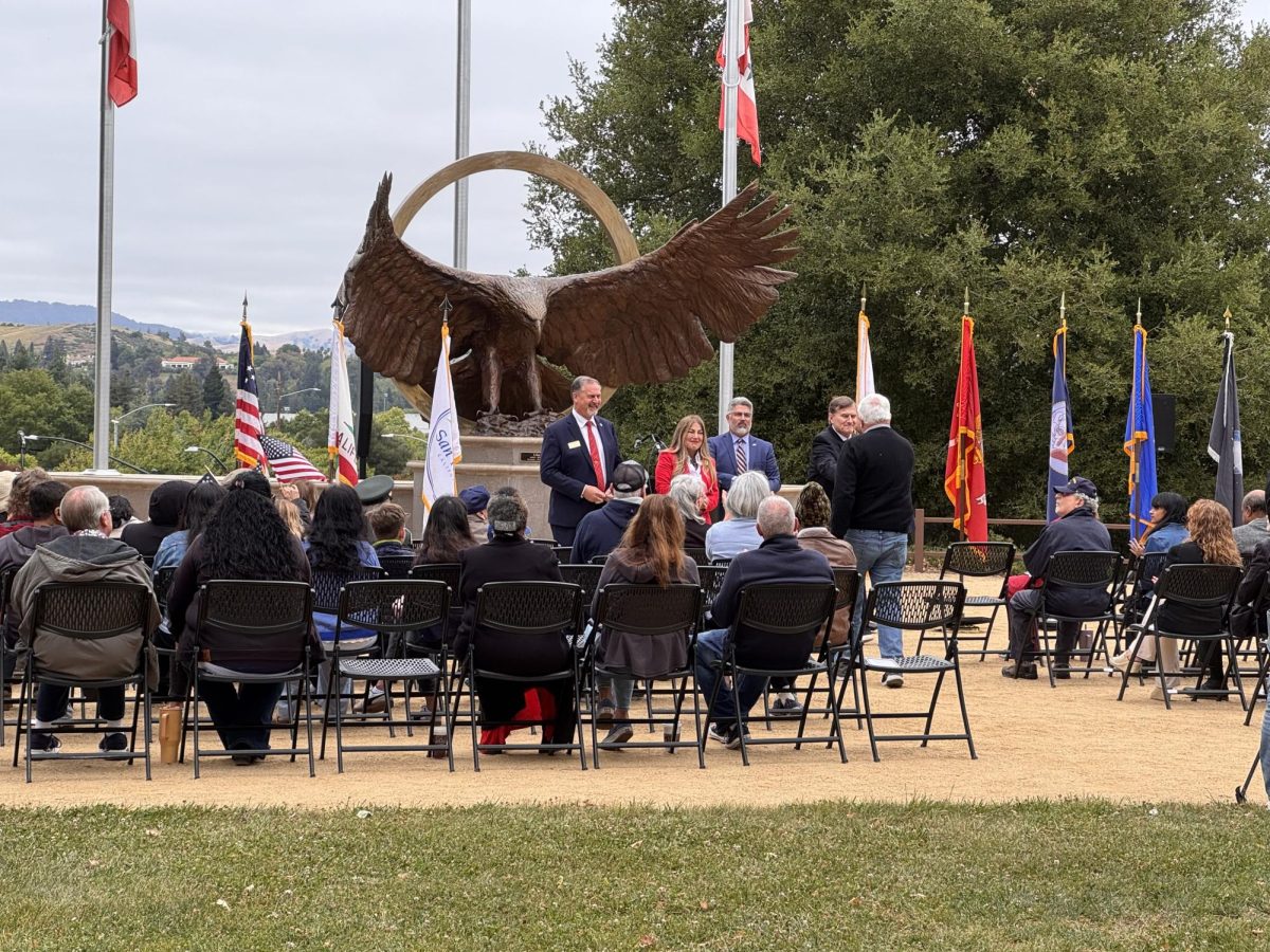 Members from the San Ramon City Council passing out Challenge Coins to Veterans.